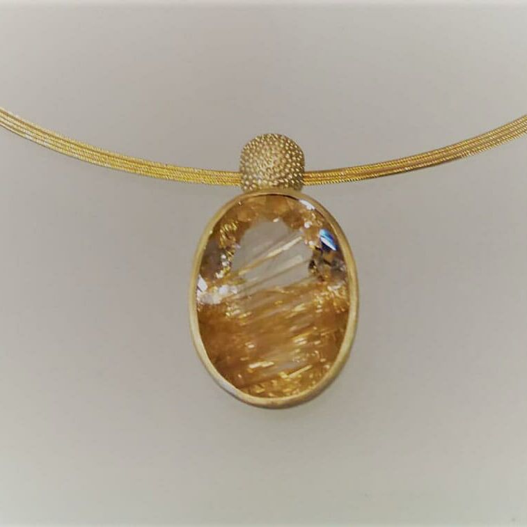 Anhänger aus 750 Gold mit Rutilquarz